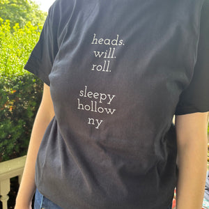 Black "heads will roll." T-Shirt